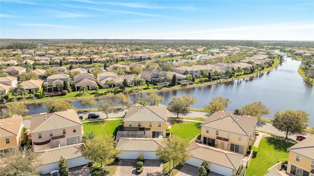 aerial view featuring a water view and a residential view