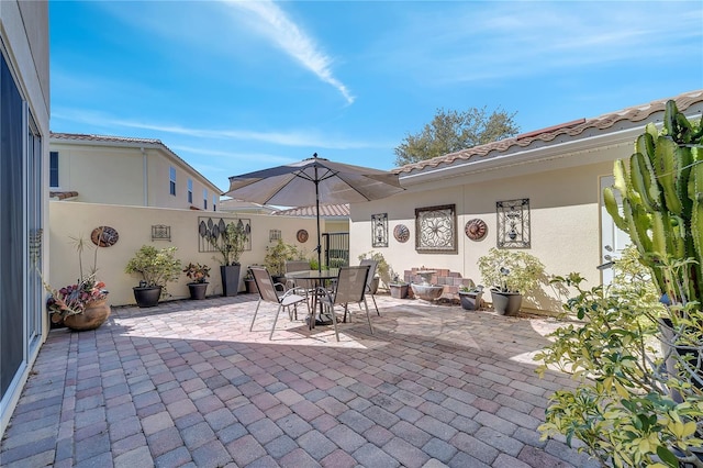 view of patio featuring outdoor dining space