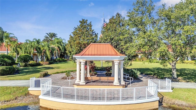 view of community with a gazebo and a yard