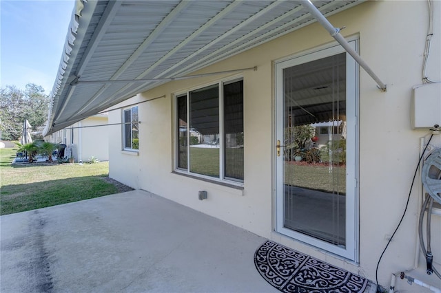 exterior space featuring a yard and a patio