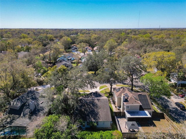 bird's eye view featuring a view of trees