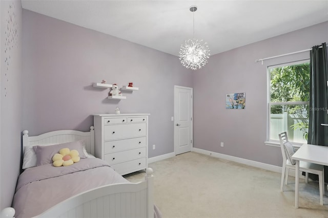 bedroom with baseboards, light carpet, and a chandelier