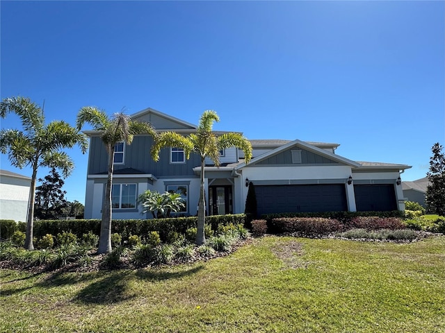 view of front facade featuring a garage and a front yard