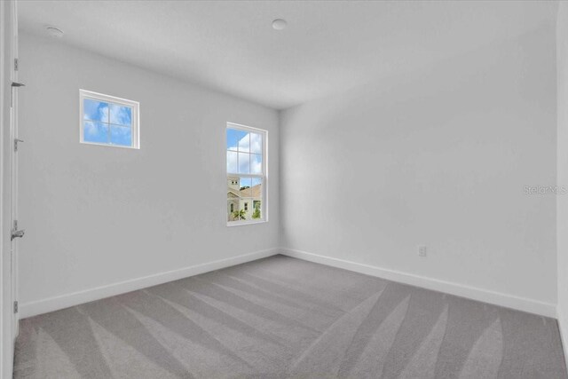 1067 Signet, Apollo Beach, FL 33572 - carpeted spare room featuring baseboards