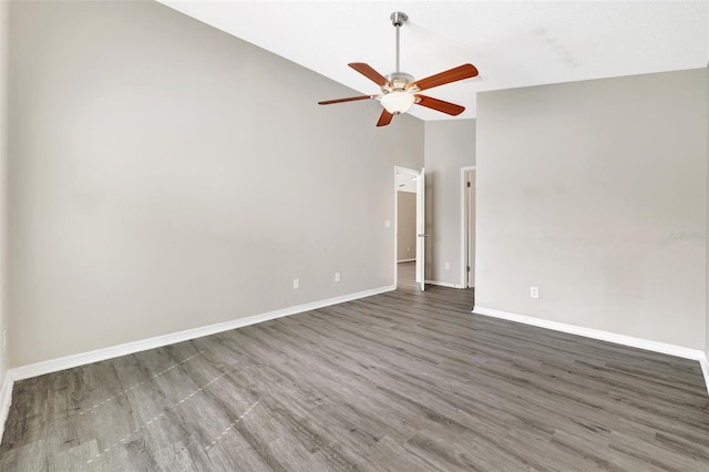 unfurnished room featuring high vaulted ceiling, ceiling fan, baseboards, and wood finished floors