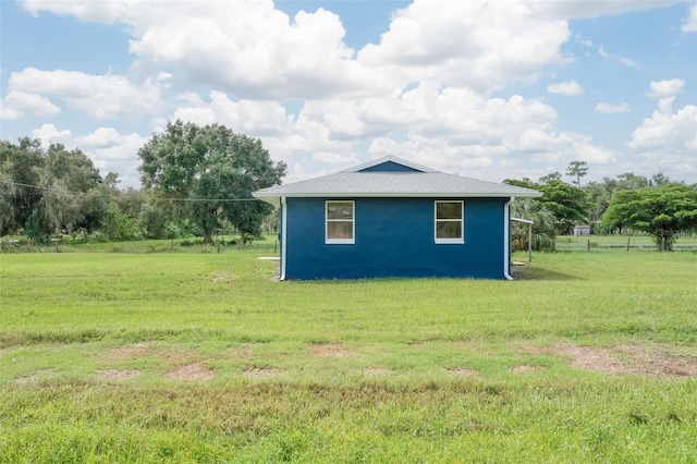 view of home's exterior featuring a lawn