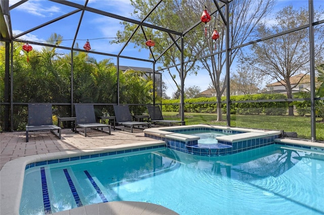 outdoor pool with a patio, glass enclosure, and an in ground hot tub