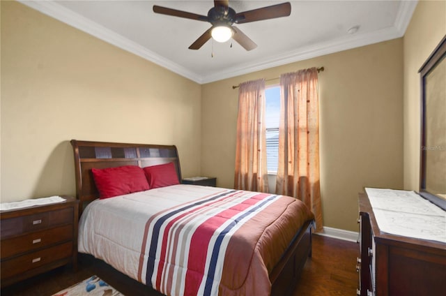 bedroom featuring ceiling fan, baseboards, dark wood-style flooring, and crown molding