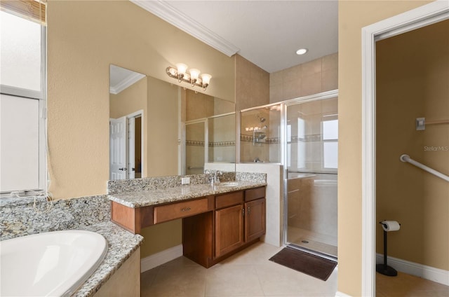 bathroom with vanity, a garden tub, a stall shower, and crown molding