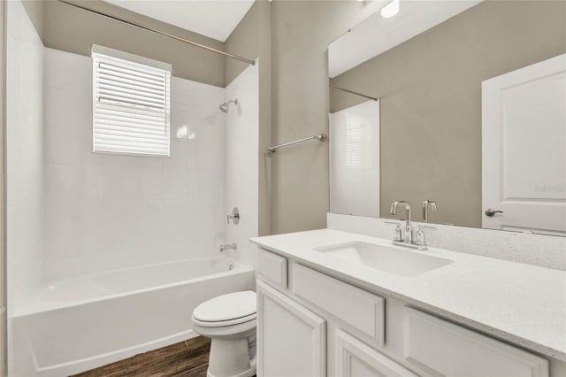 full bathroom featuring vanity, toilet, shower / bathing tub combination, and wood finished floors