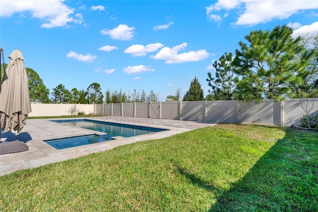 view of pool with a fenced in pool, a lawn, a fenced backyard, and a patio area