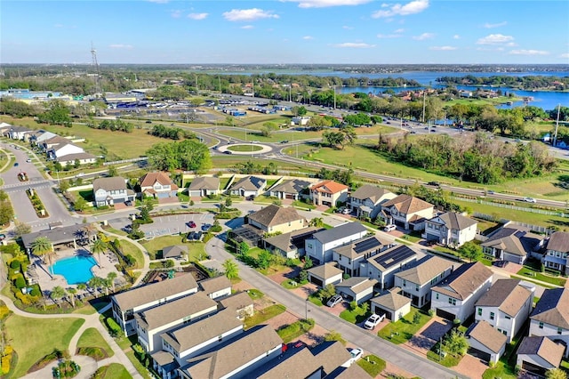 bird's eye view featuring a residential view and a water view