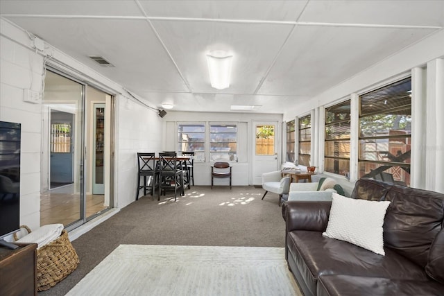 sunroom featuring visible vents