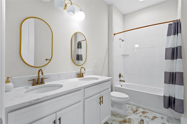 bathroom with double vanity, shower / bath combo, toilet, and a sink