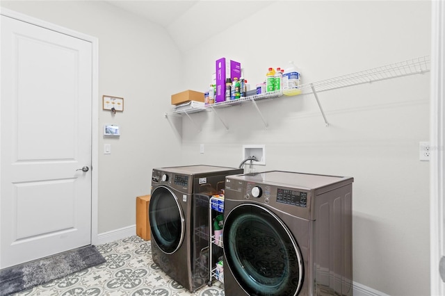 washroom with laundry area, independent washer and dryer, tile patterned flooring, and baseboards