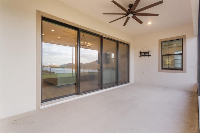 view of patio featuring a ceiling fan