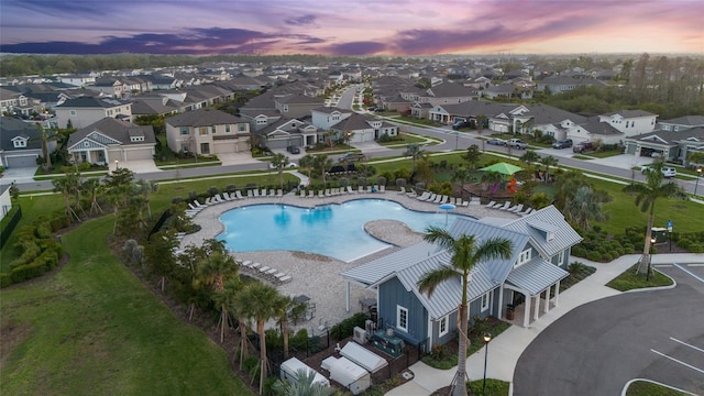 aerial view at dusk with a residential view