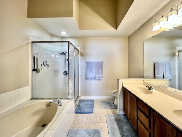 bathroom featuring a stall shower, a sink, a bath, and tile patterned floors