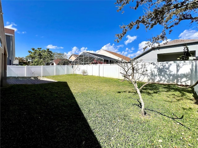 view of yard featuring a fenced backyard