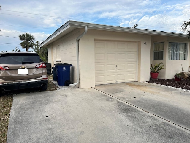 garage with driveway