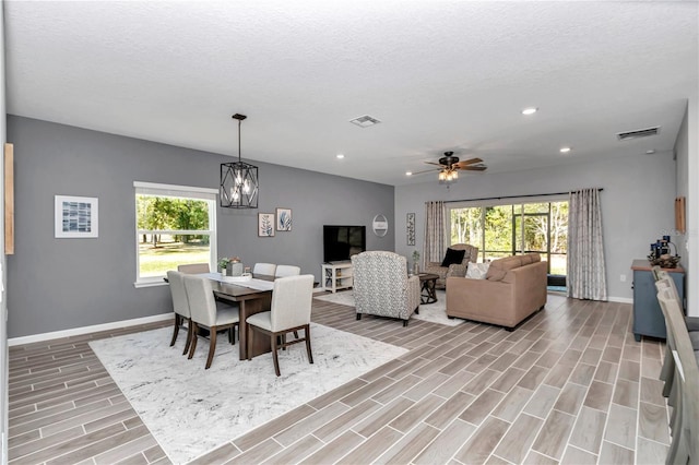 dining space featuring recessed lighting, visible vents, and baseboards