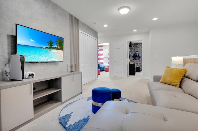 living room featuring recessed lighting and light colored carpet