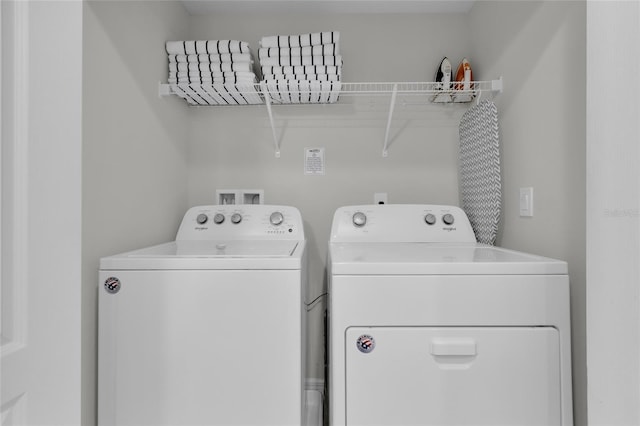 washroom with washer and dryer and laundry area