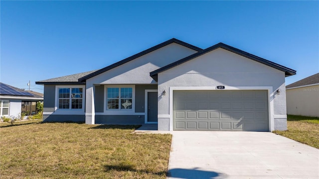 ranch-style home featuring a front yard, concrete driveway, an attached garage, and stucco siding