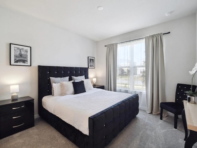 bedroom featuring carpet