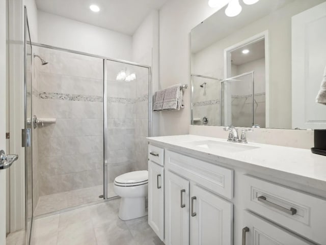 full bath featuring recessed lighting, a shower stall, toilet, and vanity