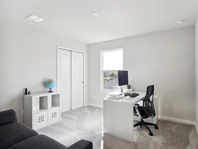 office area featuring carpet floors and baseboards