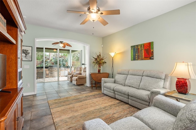 living room featuring a ceiling fan