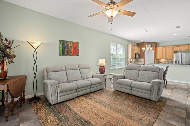 living area featuring ceiling fan, recessed lighting, visible vents, and baseboards