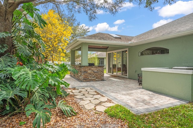 exterior space with an outdoor kitchen