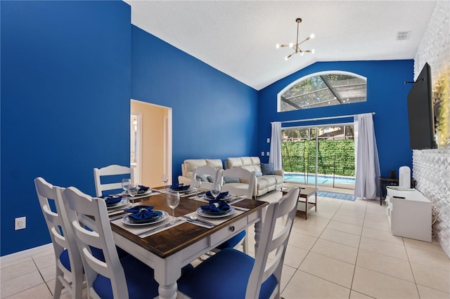 dining room featuring visible vents, vaulted ceiling, a textured ceiling, a notable chandelier, and light tile patterned flooring