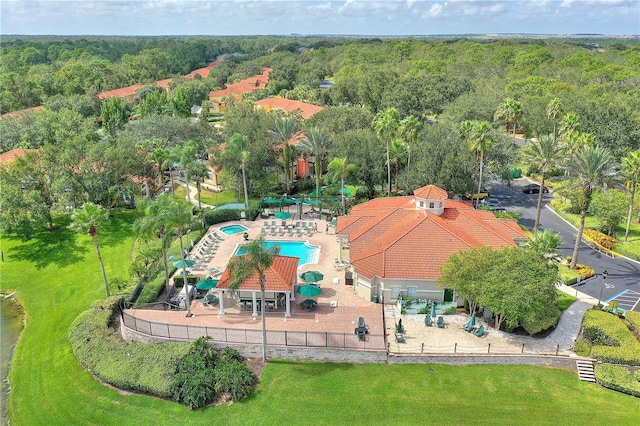 drone / aerial view with a view of trees