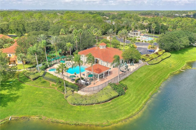 bird's eye view featuring a water view and a wooded view