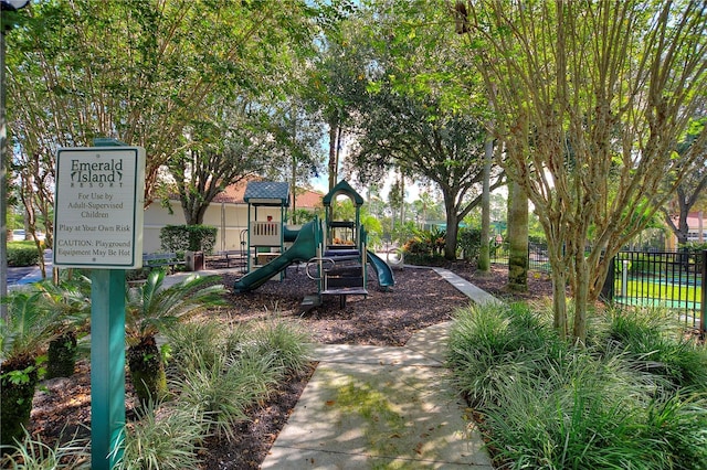 community jungle gym with fence