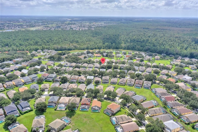 bird's eye view with a residential view and a forest view