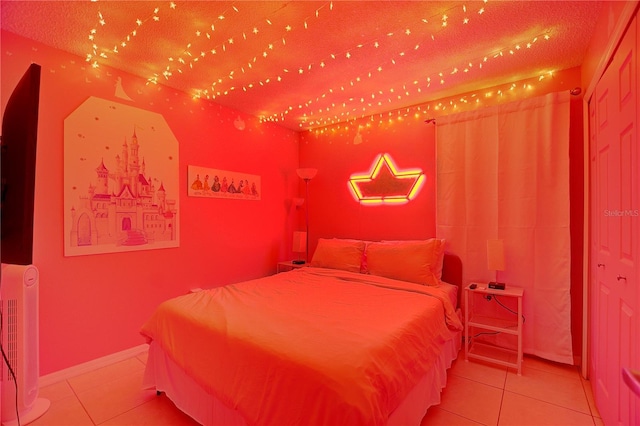 tiled bedroom with baseboards