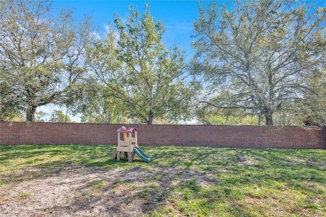 view of yard featuring fence