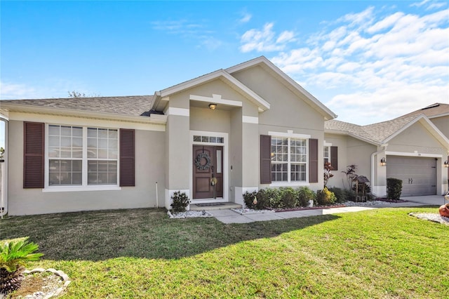 ranch-style home featuring a garage, a front lawn, and stucco siding