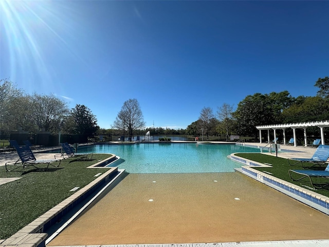 pool featuring a patio area and a pergola