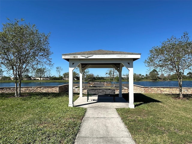 view of yard with a water view and a gazebo