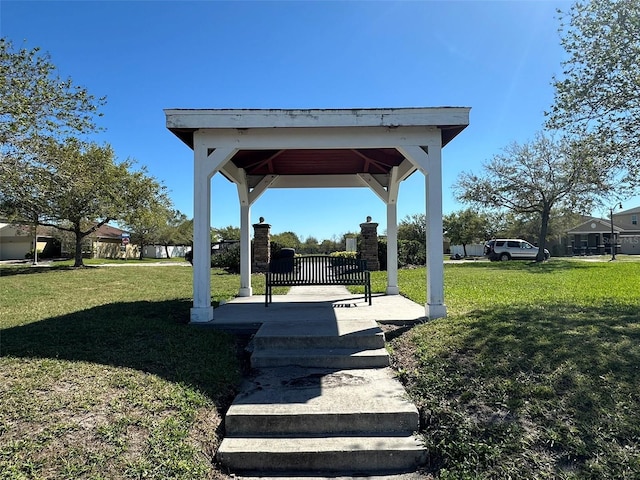 view of community featuring a gazebo and a lawn