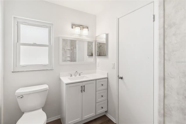 full bathroom featuring toilet and vanity