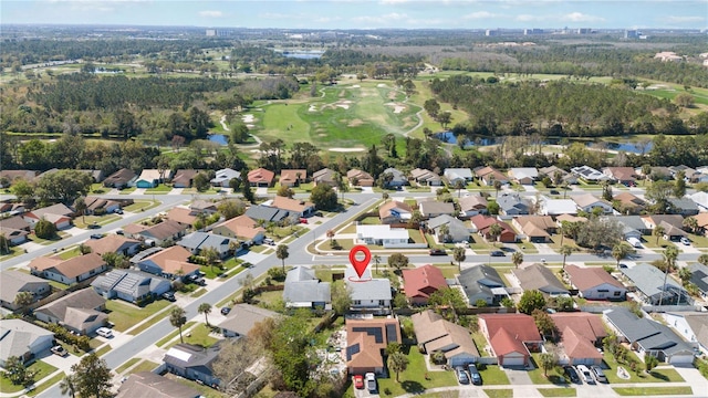 bird's eye view featuring a water view, a residential view, and golf course view