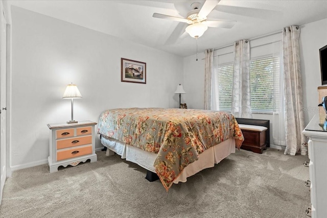 bedroom featuring carpet, ceiling fan, and baseboards