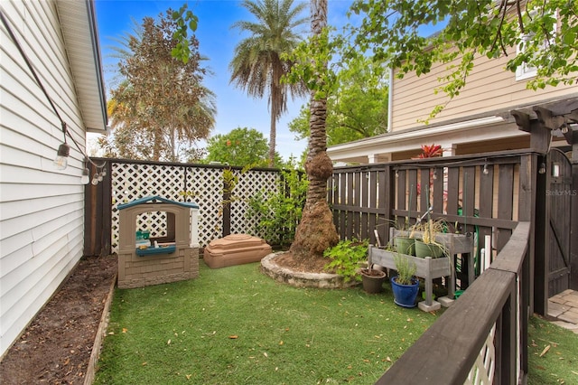 view of yard featuring fence