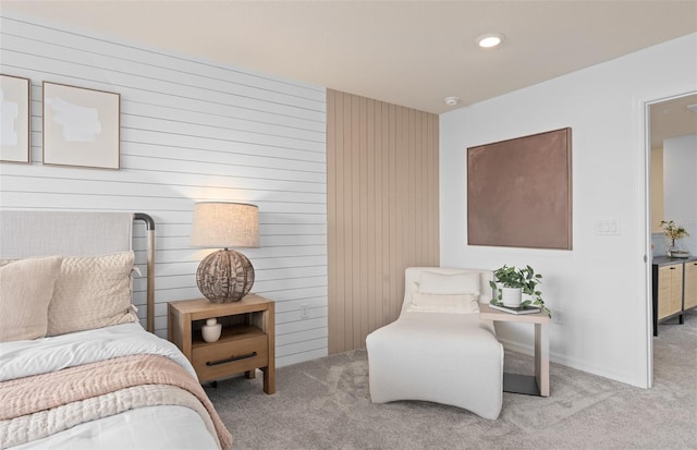 bedroom with carpet floors and baseboards